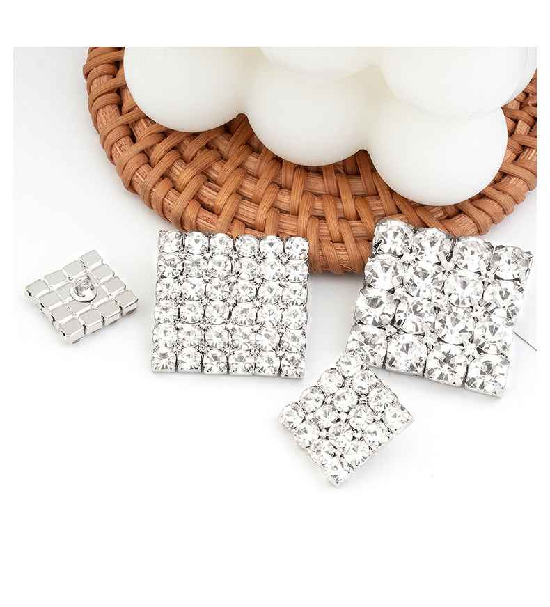 Square rhinestone metal buttons for coats, shown from the front