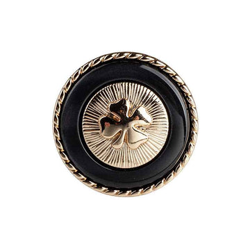 Black resin button with four-leaf clover design, gold border and metal shank