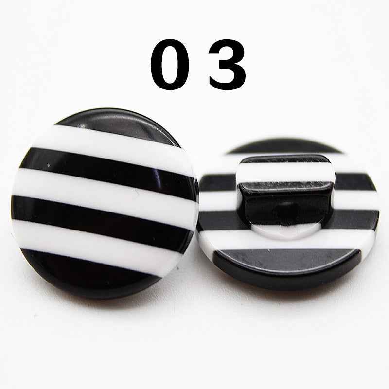 Color 03: black-and-white striped resin shirt button, round shank, front and back.