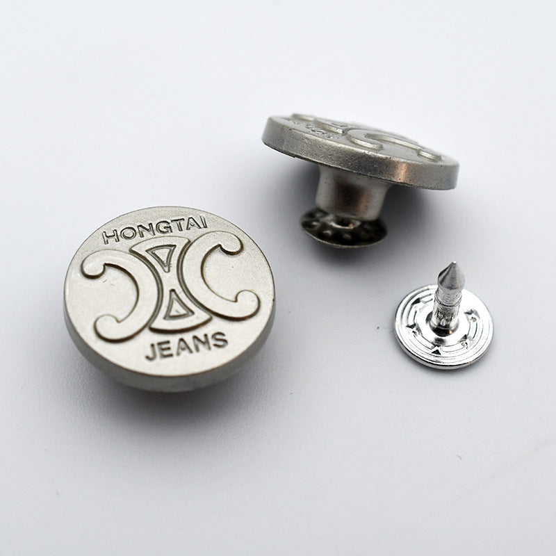 Round metal shank stud button with “HONGTAI” and “JEANS” text front plus pointed post
