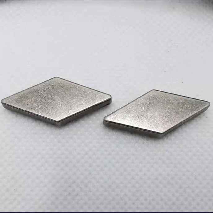Flat square alloy rivet heads in antique silver finish (2 pieces shown)