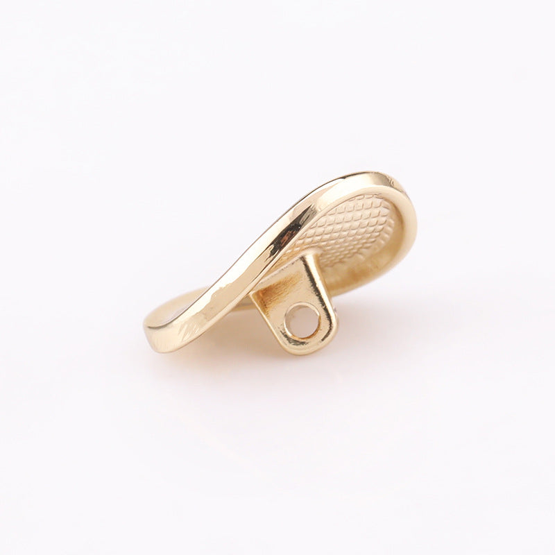 Bottoni a uovo metallici Light Gold: retro con trama e foro del gambo