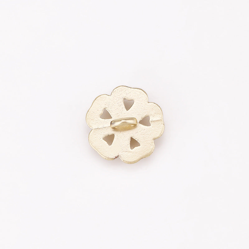 Sunflower rhinestone shank button underside, light gold metal with cutouts