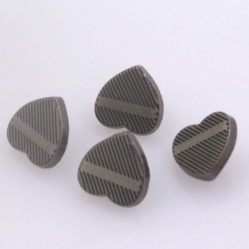 Nickel-toned heart metal shank buttons with striped ridges and shank hole