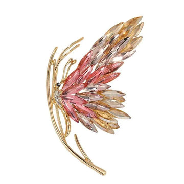 Red crystal butterfly brooch with gold-tone rhinestone body and multi-faceted wings