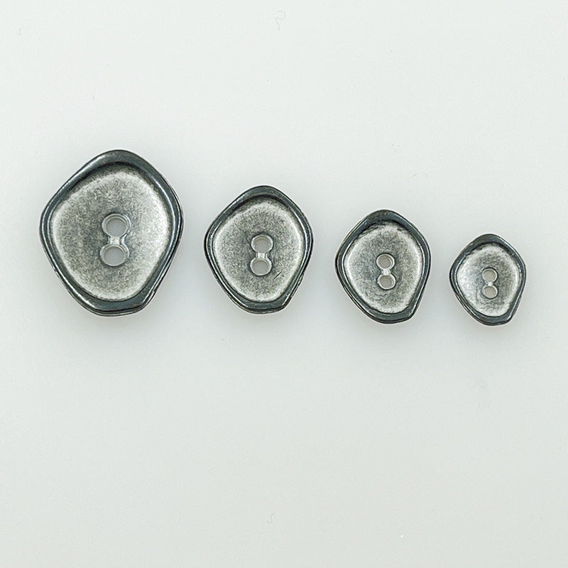 Silver irregular 2-hole metal buttons, four sizes with dark edge trim and loop-style holes