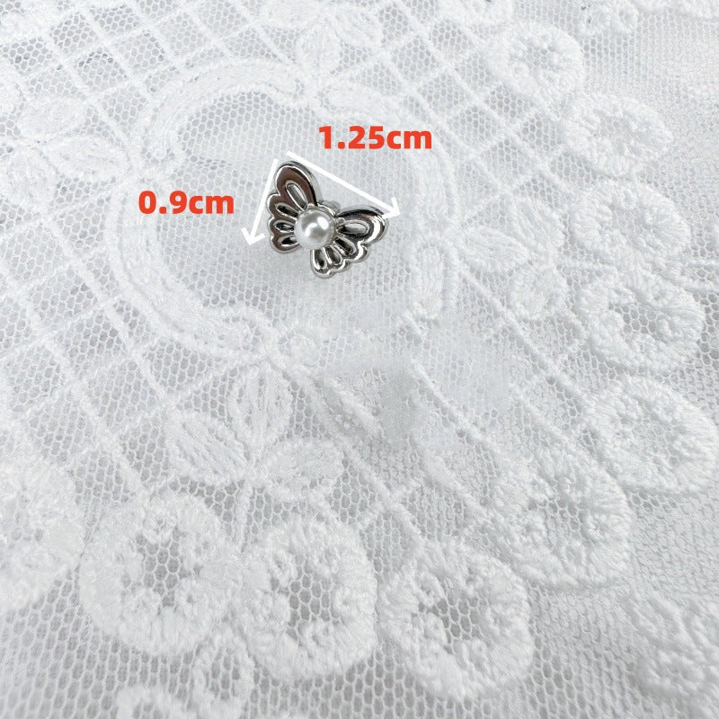 Butterfly pearl metal shank button, silver-tone; 1.25cm x 0.9cm
