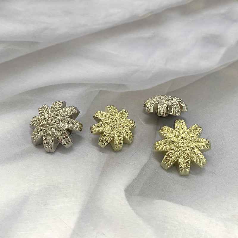 Gold Metal Leaf shank buttons, three snowflake-style designs