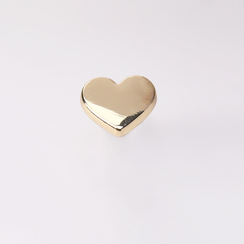 Light gold heart-shaped metal shank button, smooth face