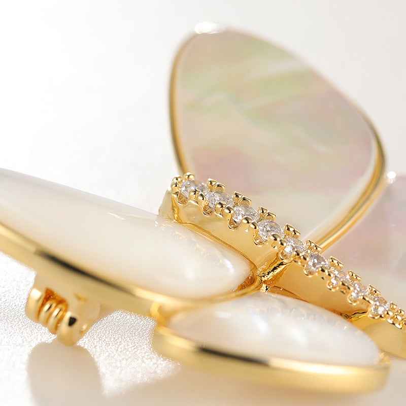 Close-up butterfly brooch pin: opal-like shell wing outlines with zircon detail, Color A