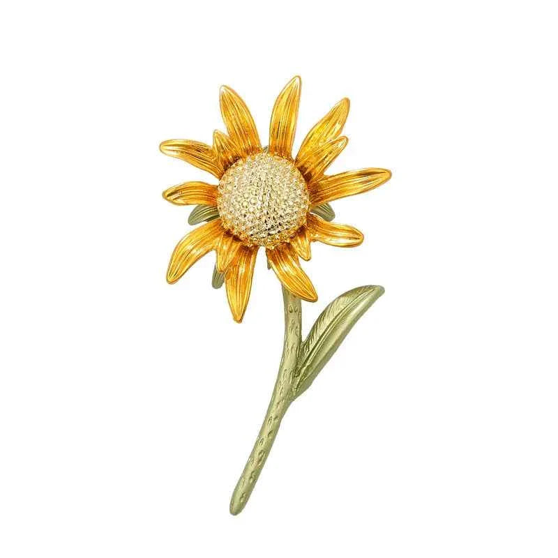 Vintage sunflower enamel brooch pin with gold-tone petals and textured center