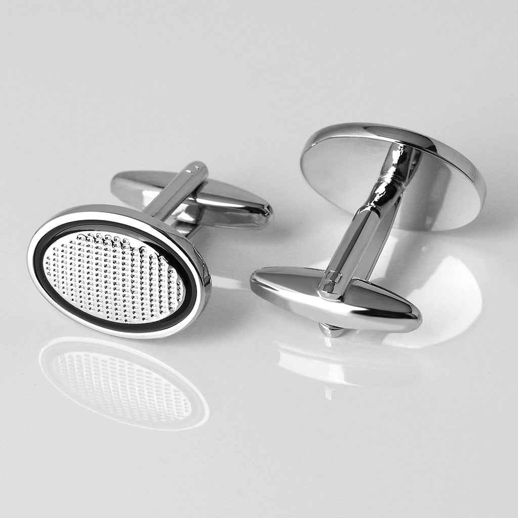 Oval cufflinks with black border, silver bars, and textured white dotted face