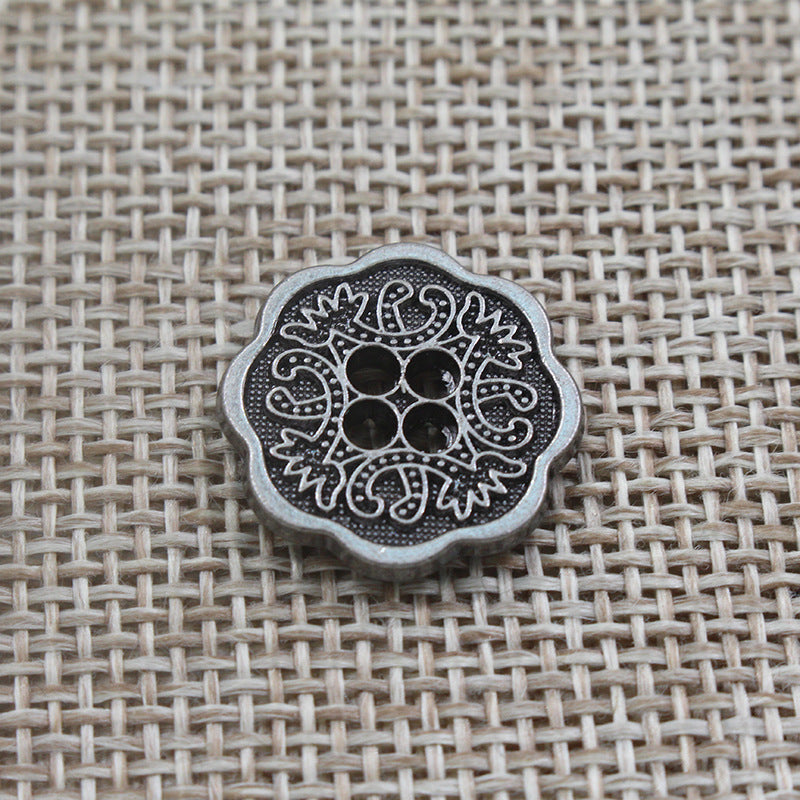Black and silver tone vintage floral 4-hole alloy button with etched filigree