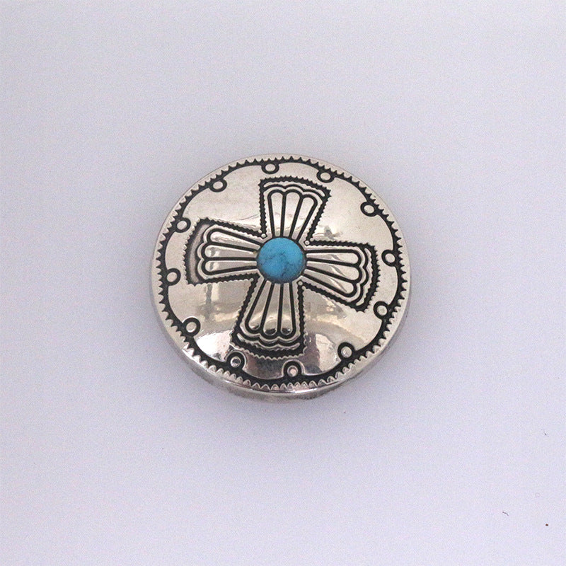 Turquoise metal stud button with cross-shaped filigree and blue center stone