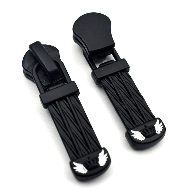 Black plastic zipper pulls, narrow body with ribbed sides and cat emblem, 10-pack