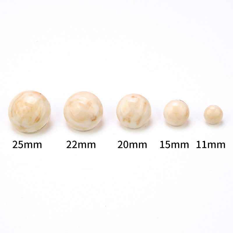 Ivory cat-eye shank buttons in sizes 25mm, 22mm, 20mm, 15mm, 11mm, round
