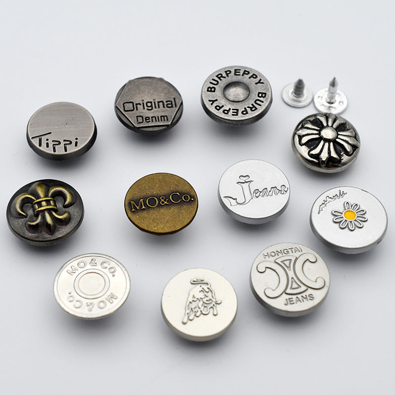 Round denim stud buttons with printed logos and domed fronts, metal shank backs included