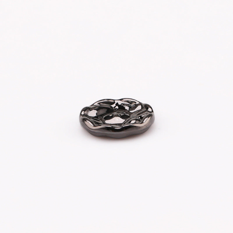 Round 2-hole metal button, gunmetal black, 11mm, close-up side view