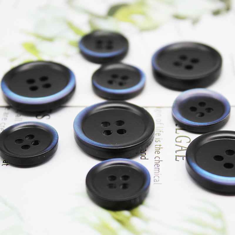 Multiple round black resin buttons with blue gradient edges, 4-hole design