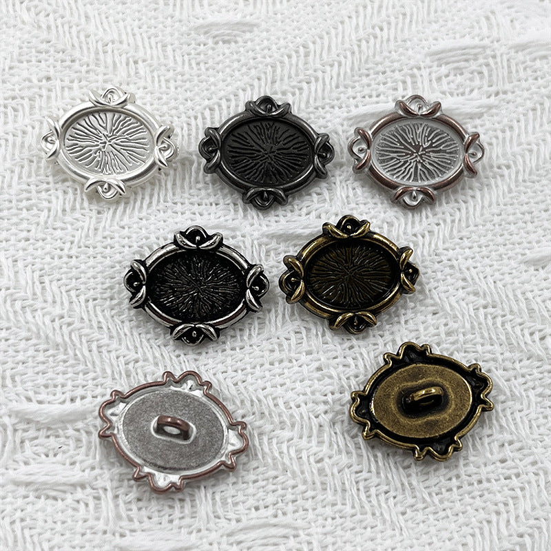 Oval metal shank buttons with engraved floral motif in silver, black, rose-gold, and bronze