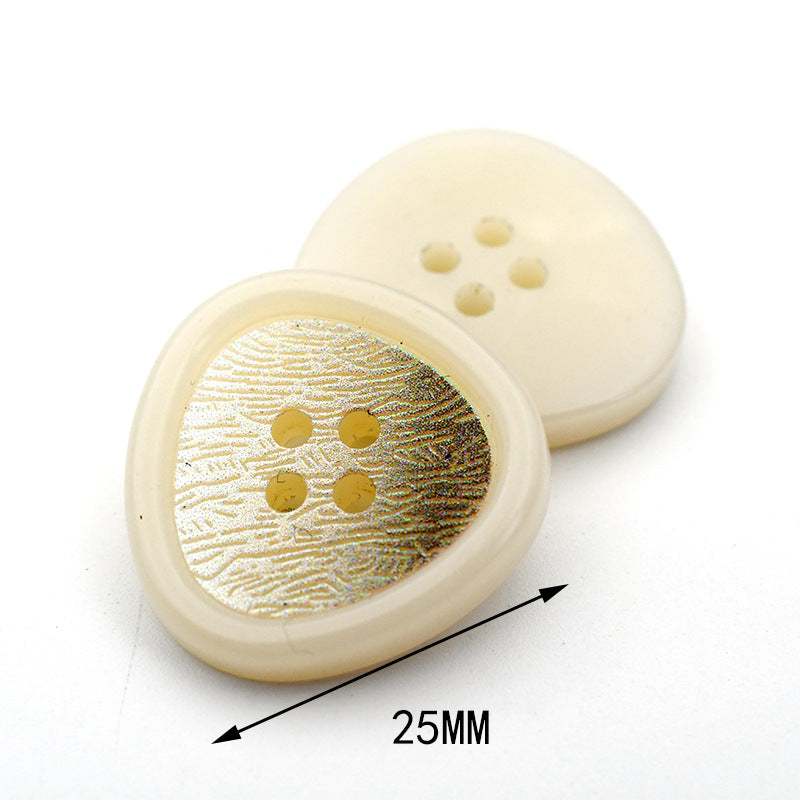 Round beige resin button with textured top and 4 holes; size 25mm