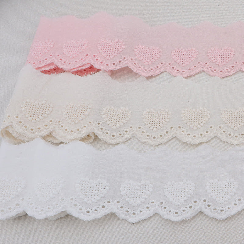 Pink and white cotton lace trim with hollow heart embroidery, wavy scalloped edge