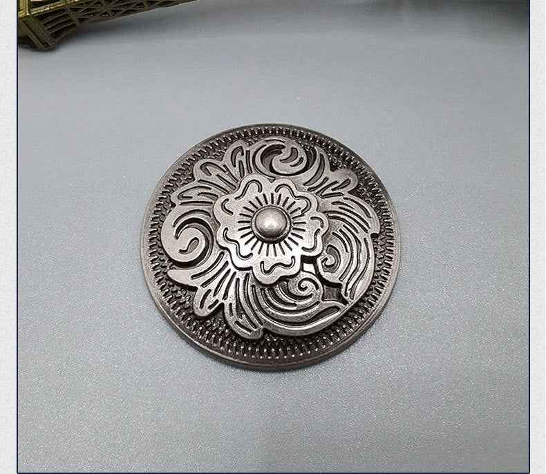 Round antique silver arabesque screw-back stud button with floral swirl center