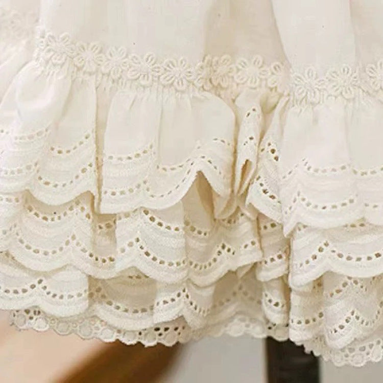 Cream cotton lace trim with scalloped eyelet waves and gathered pleated ruffles