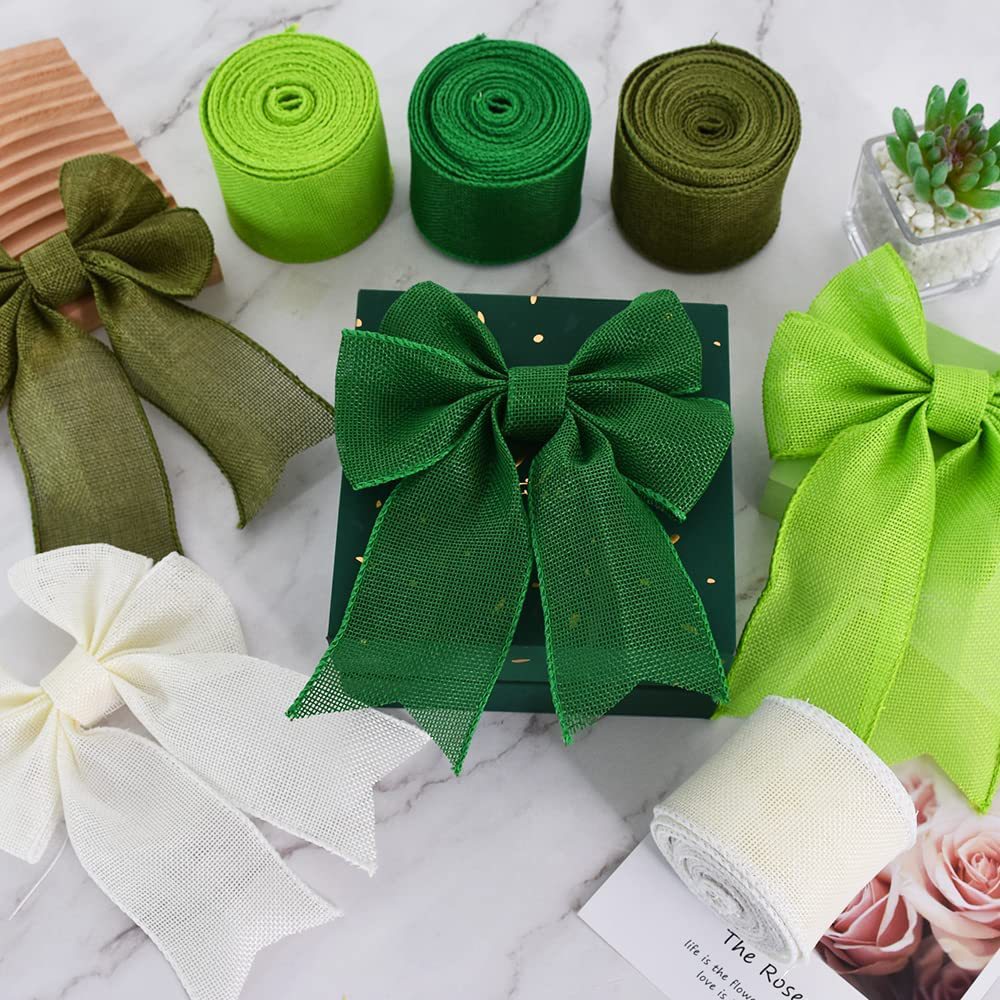 Green cotton ribbon spools with coordinated bow tails for wreath making