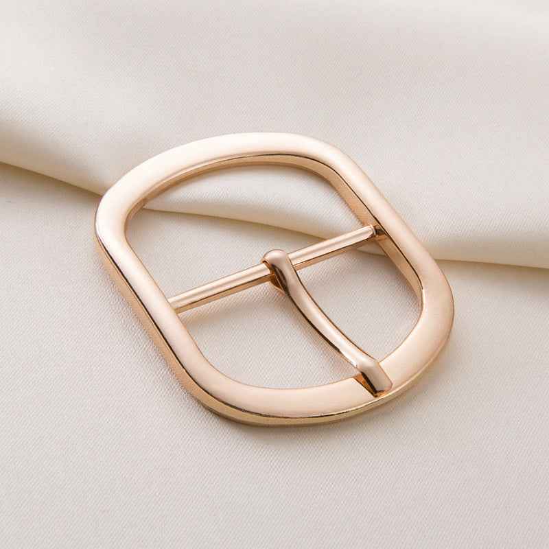Gold metal center-bar belt buckle with pin adjustable fastener