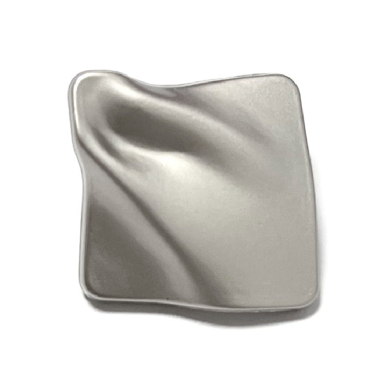 Nickel diamond-textured metal shank button with square dimpled front