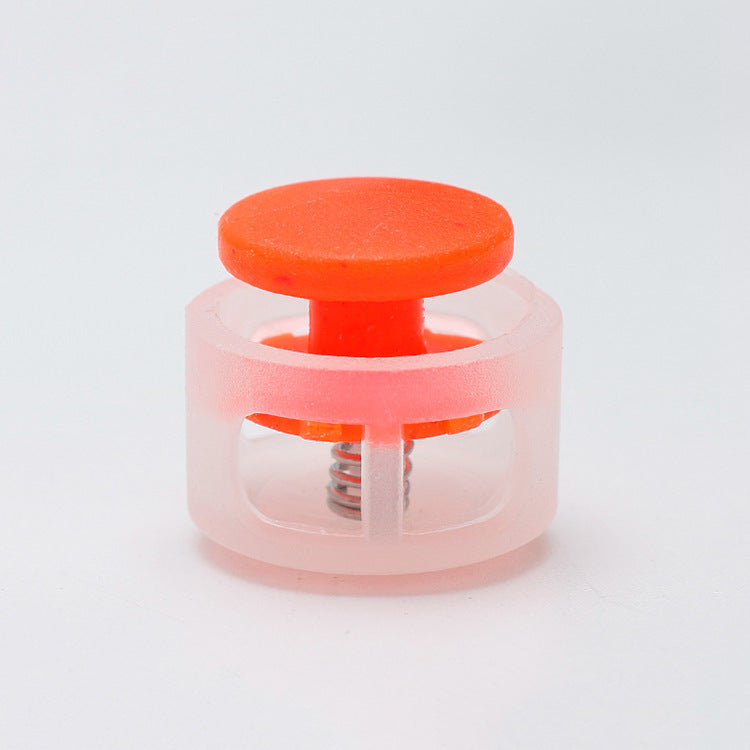 Orange 17mm plastic cord lock toggle with spring stopper, clear base