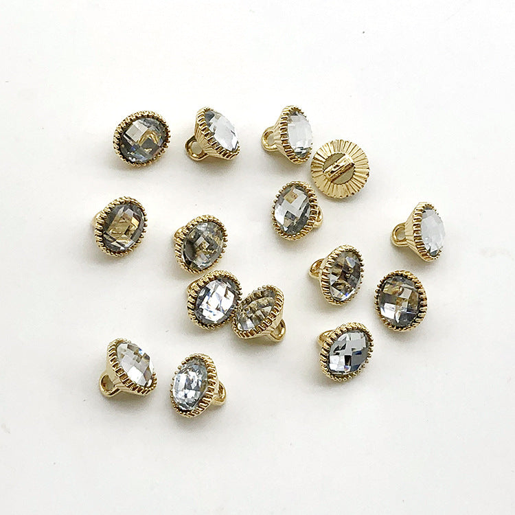 Metall-Shirtknöpfe 10mm, goldene Fassung, klare Ziersteine; 30er Set