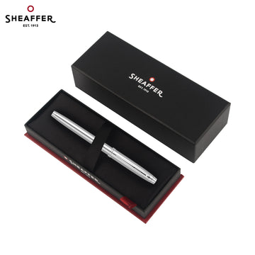 Pióro wieczne Sheaffer 100 – stalówka cienka (F, ~0.5 mm), biała klipsa, w całości stalowe / czarny lakier / niebieski lakier