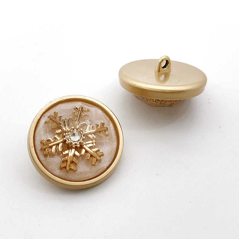 Gold 22mm round rhinestone shank button, snowflake design with clear center