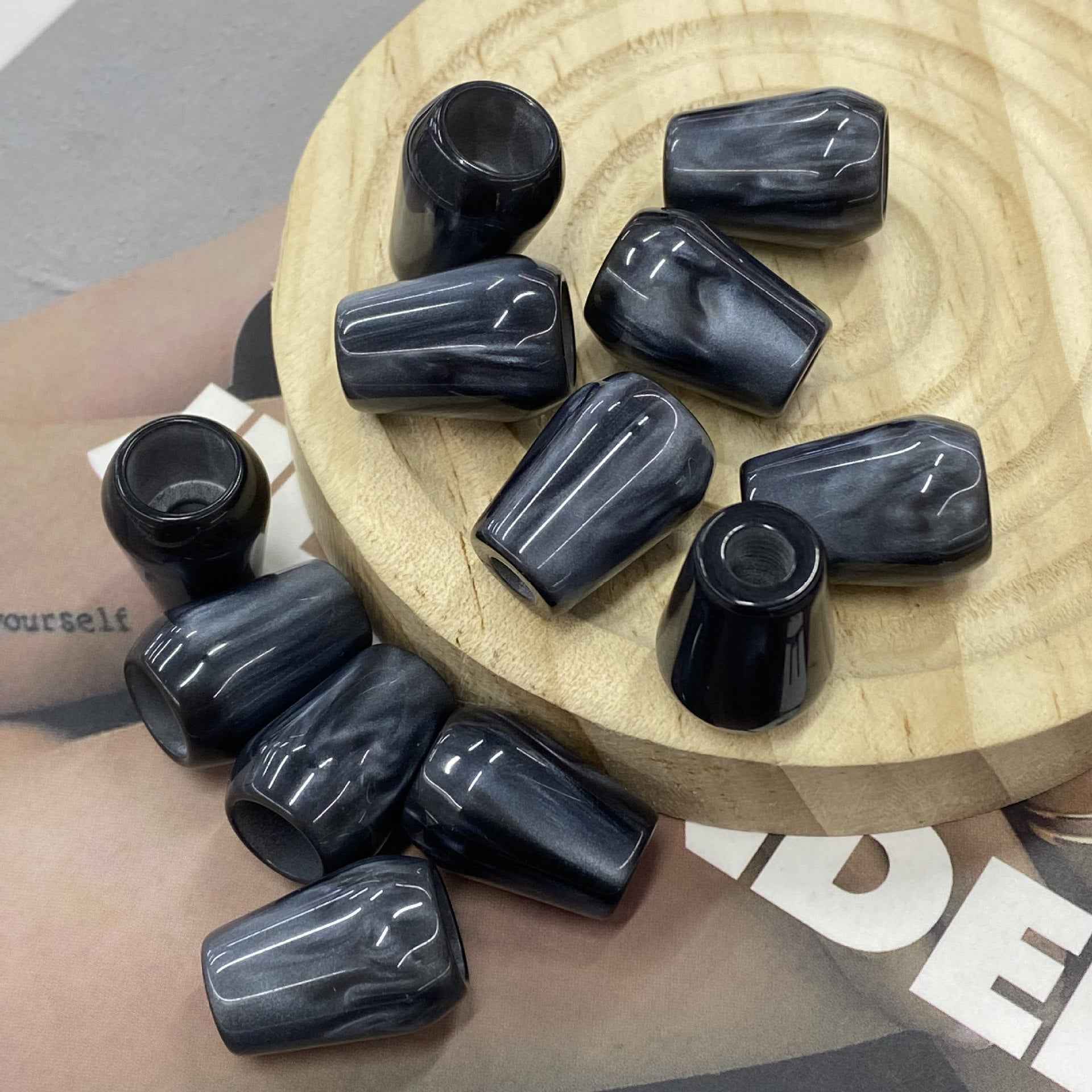 Black resin bell cord buttons, 20mm, single-hole, assorted pieces