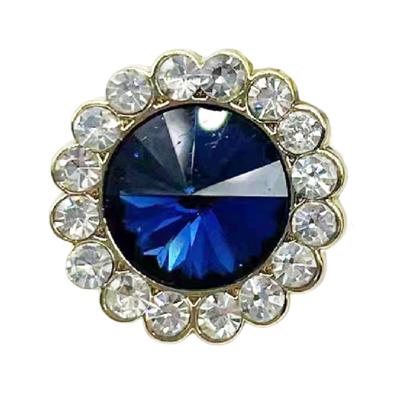 Rhinestone flower button with deep blue round center and gold-toned border