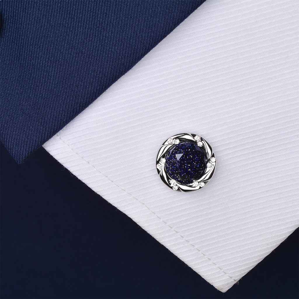 Blue stone cufflinks with round silver bezel and sparkling clear stone accents