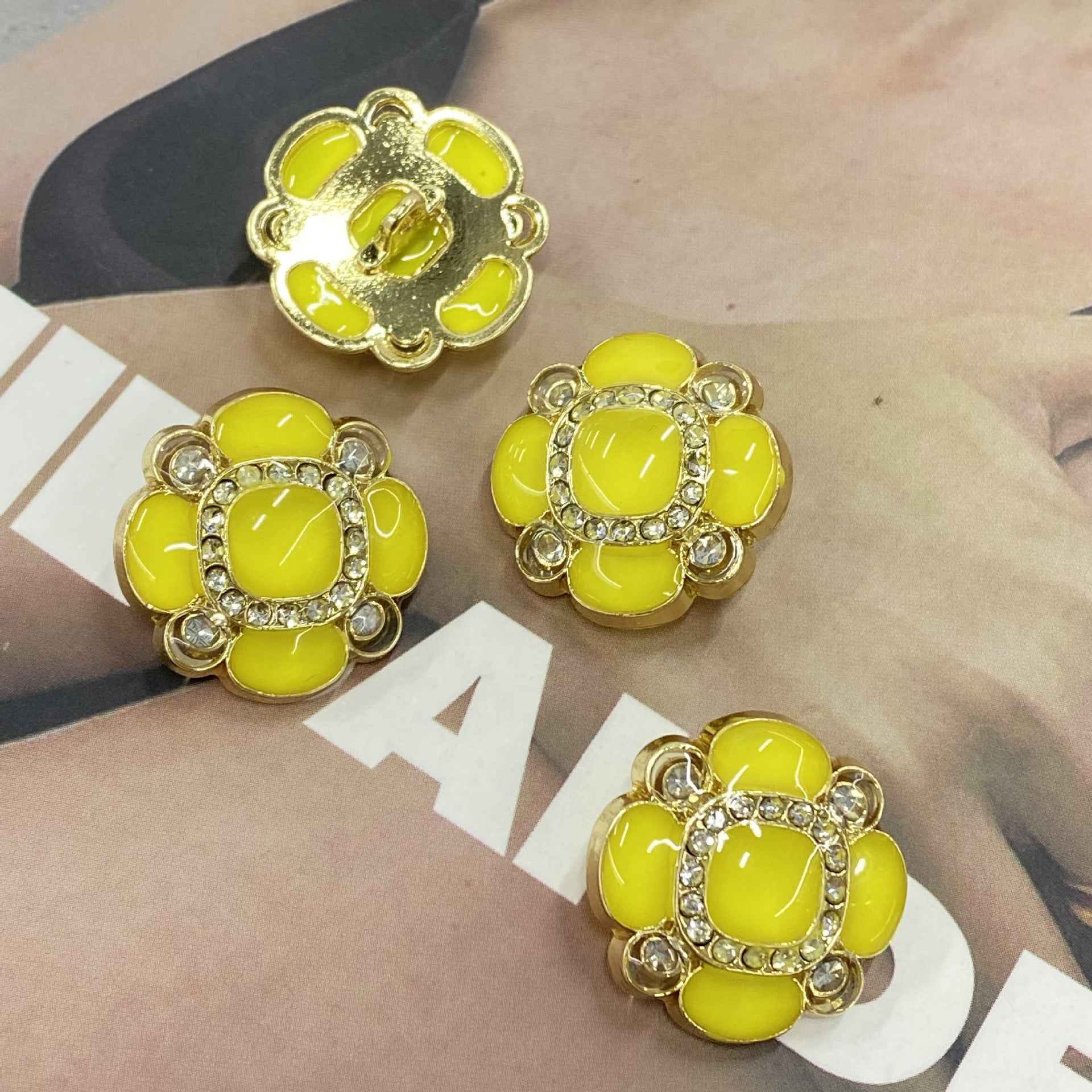 Jelly flower metal shank buttons, bright yellow oval center with rhinestone rim
