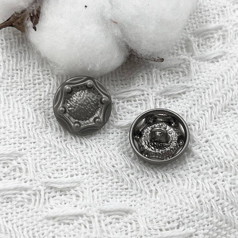 18mm zinc alloy shank button, silver tone front and back view on fabric