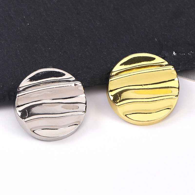 Gold and silver crinkle wave metal shank buttons, paired front views