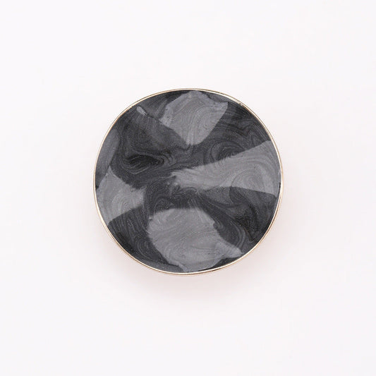 Black irregular dot oil coat button with metal rim and shank