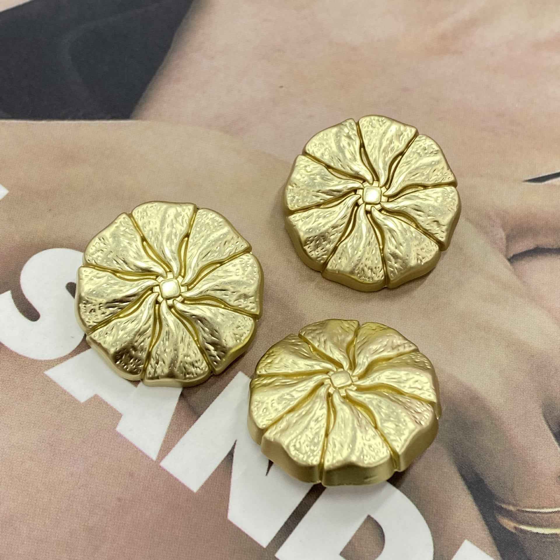 15–23 mm floral metal shank buttons, light gold finish, embossed flower design