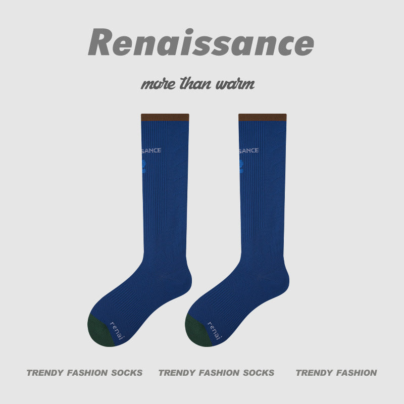 Blue compression crew running socks with brown cuff and green sole, women’s fit, pair