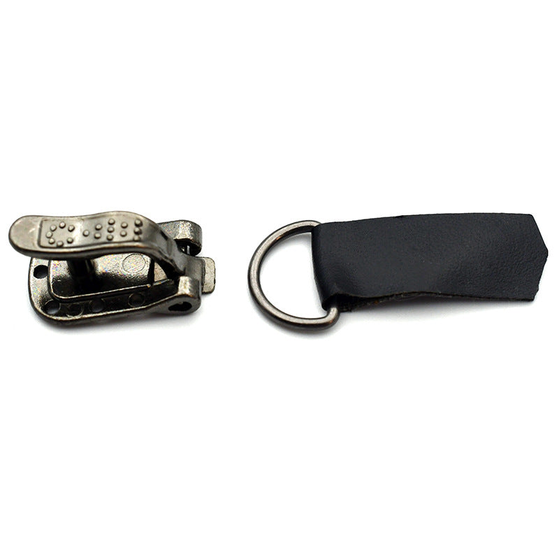 Close view of black strap and silver metal invisible snap fastener component