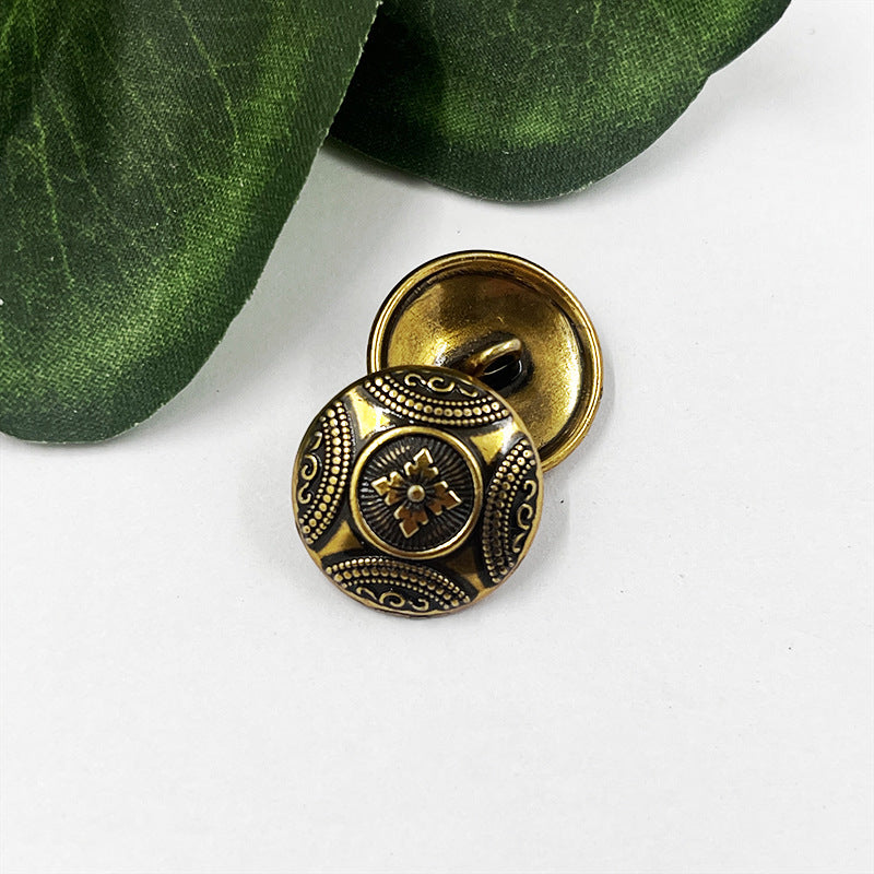 Antique gold flower metal shank button, round face with engraved rosette
