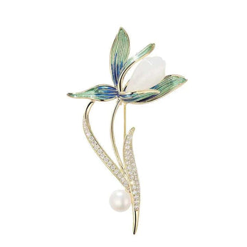 Enamel Magnolia brooch pin with blue-green petals, white pearl center, gold tone frame