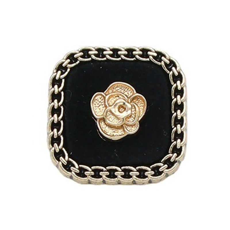 Square black flocked sweater button with gold rose flower and metal chain trim
