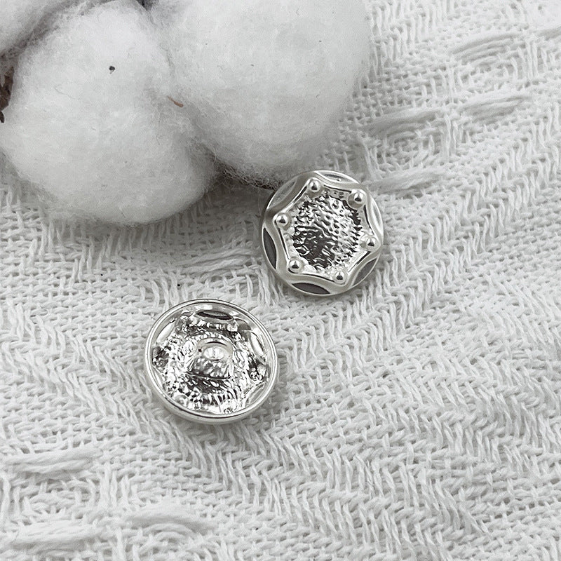 18mm zinc alloy shank button, silver tone front with ornate textured design