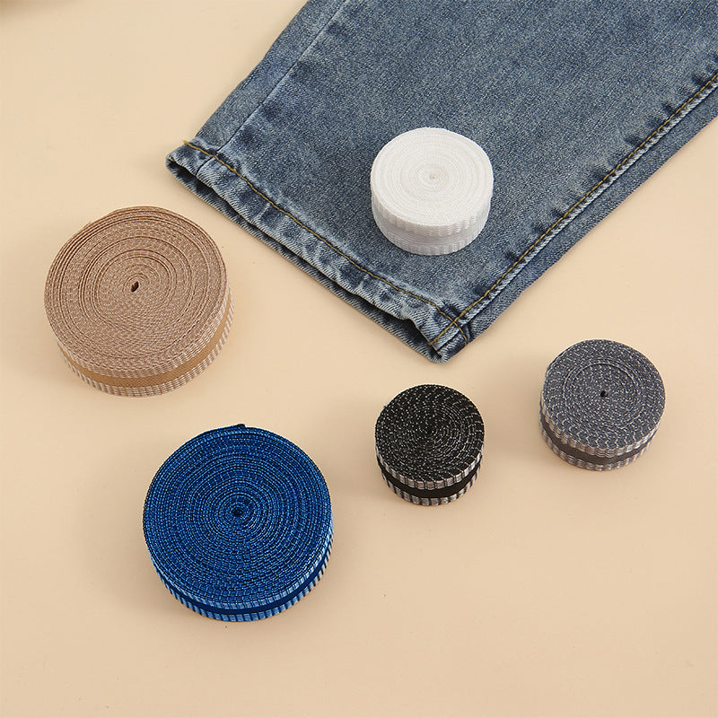 Rolls of iron-on hem tape in white, beige, blue, black, and grey (assorted colors)